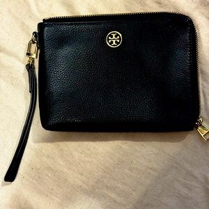 Tory Burch black leather wristlet with 3/4 zipper closure, with handle.